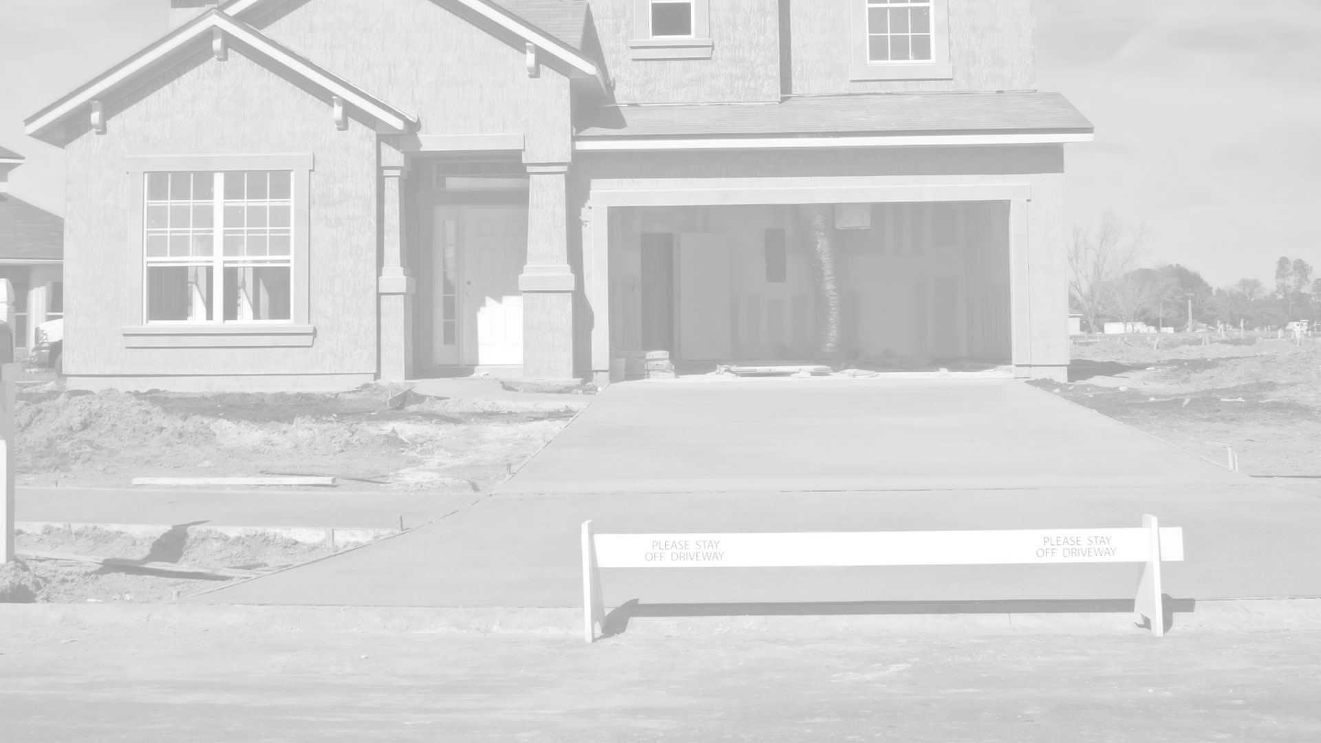 We poured this new concrete driveway and sidewalk at this newly constructed home in Bloomington, IL.